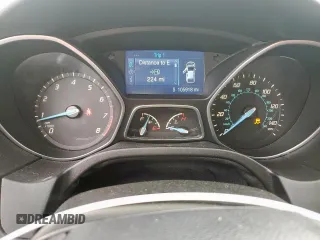 2014 Ford Focus SE z VIN 1FADP3K24EL187042, wystawiony jako Copart lot #57636395 z przebiegiem 105 918 mil mil oraz Szkoda całkowita • Salvage title. Historia ofert i sprzedaży dostępna na DreamBid. Obrazek 9.