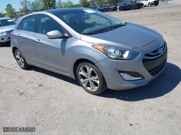 2013 Hyundai Elantra GT with VIN KMHD35LE9DU058163, listed as a IAAI auction lot 42067923 with 180,638 mi miles. Bid and sale history available at carsss.com. Image 1.