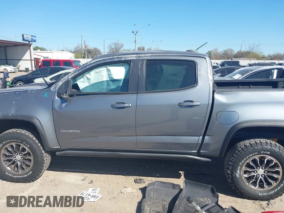 2018 Chevrolet Colorado 4WD ZR2 z VIN 1GCGTEEN0J1115894, wystawiony jako IAAI lot #41774860 z przebiegiem 71 698 mil mil oraz . Historia ofert i sprzedaży dostępna na DreamBid. Obrazek 15.