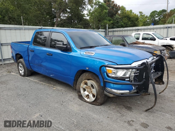 2023 Ram 1500 Tradesman with VIN 1C6SRFGT1PN666130, listed as a Copart auction lot 69990804 with 2,229 mi miles and Salvage title. Bid and sale history available at DreamBid. Image 4.