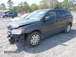 2017 Dodge Journey SE with VIN 3C4PDCABXHT538885, listed as a IAAI auction lot 41919599 with 170,311 mi miles and . Bid and sale history available at DreamBid. Image 17.