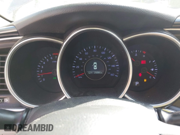 2015 Kia Optima LX with VIN 5XXGM4A77FG353705, listed as a IAAI auction lot 42519873 with 126,066 mi miles and . Bid and sale history available at DreamBid. Image 7.