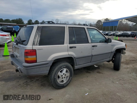 1995 Jeep Grand Cherokee Laredo with VIN 1J4GZ58S7SC517783, listed as a Copart auction lot 43057145 with 225,273 mi miles and Salvage Title. Bid and sale history available at carsss.com. Image 3.