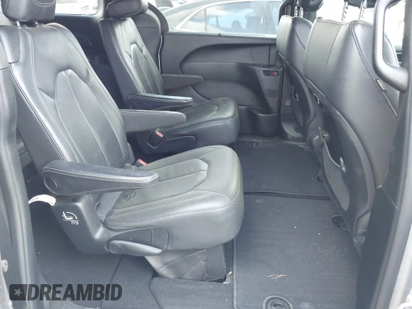 2018 Chrysler Pacifica Touring L with VIN 2C4RC1BG5JR165418, listed as a IAAI auction lot 42143241 with 157,768 mi miles and . Bid and sale history available at DreamBid. Image 8.