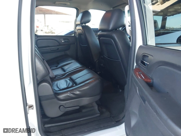 2012 Chevrolet Suburban LT with VIN 1GNSCJE05CR318556, listed as a IAAI auction lot 41654002 with 222,329 mi miles. Bid and sale history available at carsss.com. Image 8.