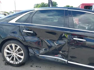 2014 Cadillac XTS Luxury z VIN 2G61N5S30E9170305, wystawiony jako IAAI lot #42223317 z przebiegiem 103 692 mil mil oraz . Historia ofert i sprzedaży dostępna na DreamBid. Obrazek 6.