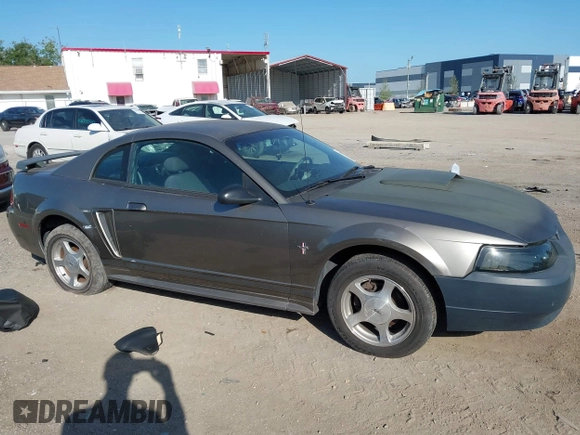 2001 Ford Mustang Standard with VIN 1FAFP40461F264327, listed as a IAAI auction lot 42002990 with 316,107 mi miles. Bid and sale history available at carsss.com. Image 12.