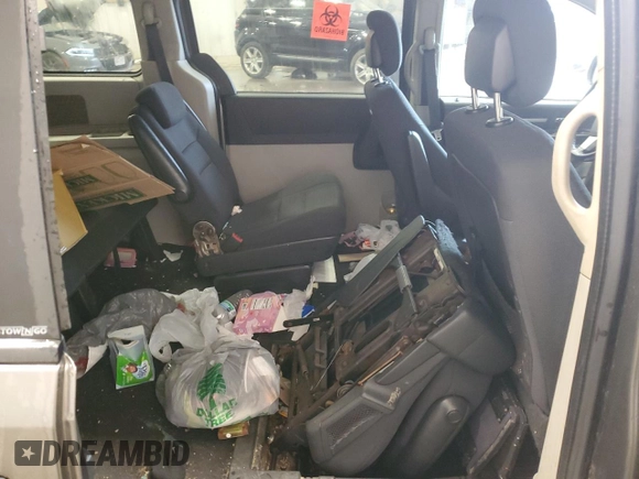 2010 Dodge Grand Caravan Hero with VIN 2D4RN3D12AR447193, listed as a Copart auction lot 52077085 with 178,885 mi miles and Non Repairable. Bid and sale history available at DreamBid. Image 11.