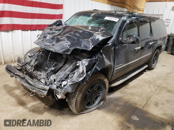 2012 GMC Yukon XL Denali with VIN 1GKS2MEFXCR319109, listed as a Copart auction lot 77485124 with Not Provided miles and Salvage Title. Bid and sale history available at carsss.com. Image 1.
