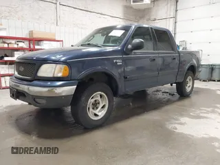 2003 Ford F-150 XLT z VIN 1FTRW08L73KC11631, wystawiony jako IAAI lot #42673130 z przebiegiem 188 945 mil mil oraz . Historia ofert i sprzedaży dostępna na DreamBid. Obrazek 17.