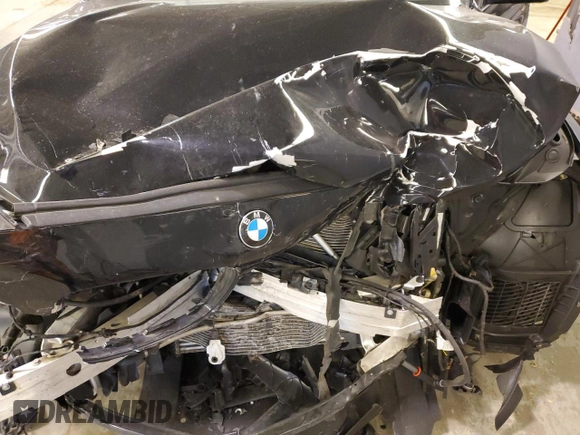 2017 BMW 5 Series 535i xDrive z VIN WBA5M4C34HD187204, wystawiony jako Copart lot #83436574 z przebiegiem 79 026 mil mil oraz Szkoda całkowita • Salvage title. Historia ofert i sprzedaży dostępna na DreamBid. Obrazek 12.