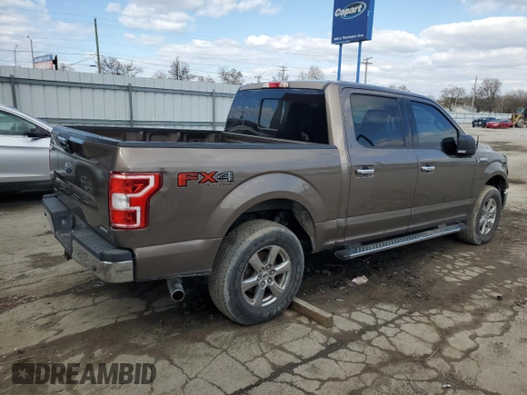 2018 Ford F-150 XL with VIN 1FTEW1EG1JKD01897, listed as a Copart auction lot 52923115 with 219,341 mi miles and Clean Title. Bid and sale history available at carsss.com. Image 3.