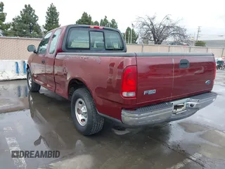 2003 Ford F-150 XL with VIN 1FTRX172X3NA92032, listed as a IAAI auction lot 41725879 with 1 mi miles. Bid and sale history available at carsss.com. Image 3.