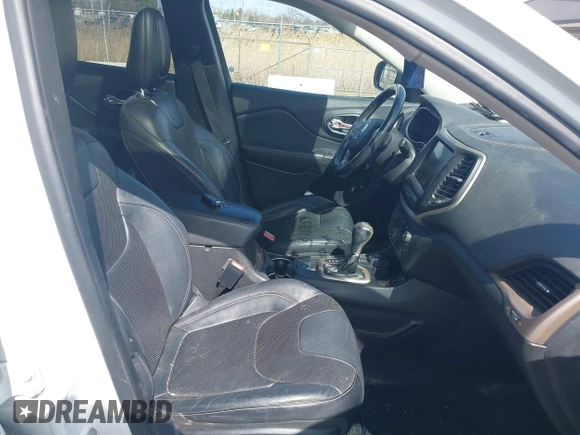 2015 Jeep Cherokee Limited with VIN 1C4PJMDS7FW522581, listed as a IAAI auction lot 41870516 with 143,904 mi miles and . Bid and sale history available at DreamBid. Image 5.