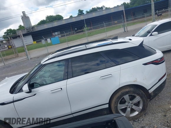 2020 Land Rover Range Rover Velar S z VIN SALYB2EX2LA256971, wystawiony jako IAAI lot #42525724 z przebiegiem 76 802 mil mil oraz . Historia ofert i sprzedaży dostępna na DreamBid. Obrazek 14.