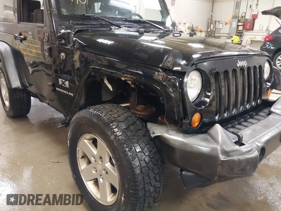 2007 Jeep Wrangler X with VIN 1J4FA24187L117446, listed as a IAAI auction lot 42177996 with 218,976 mi miles and . Bid and sale history available at DreamBid. Image 6.