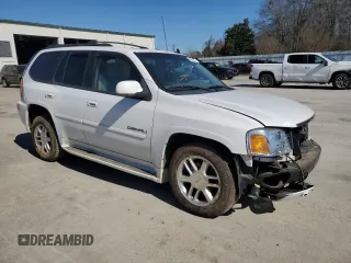 2006 GMC Envoy Denali with VIN 1GKET63M762190296, listed as a Copart auction lot 46691595 with 128,985 mi miles and Salvage Title. Bid and sale history available at carsss.com. Image 4.