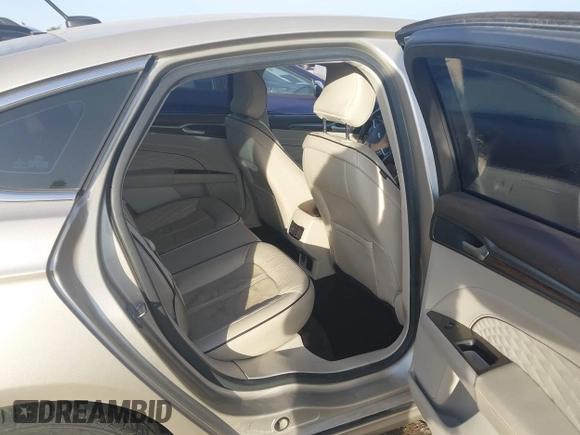 2017 Ford Fusion Titanium z VIN 3FA6P0SU5HR373140, wystawiony jako IAAI lot #41082406 z przebiegiem 98 422 mil mil oraz . Historia ofert i sprzedaży dostępna na DreamBid. Obrazek 8.