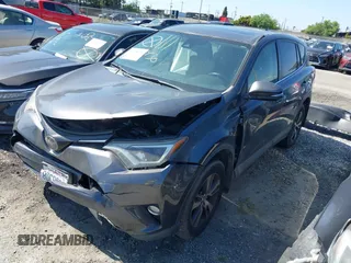 2018 Toyota RAV4 XLE with VIN JTMWFREV6JJ175575, listed as a IAAI auction lot 41788004 with 112,577 mi miles. Bid and sale history available at carsss.com. Image 22.