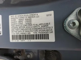2022 Honda Civic Sport Touring z VIN 19XFL1H86NE011889, wystawiony jako Copart lot #53403415 z przebiegiem 93 619 mil mil oraz Szkoda całkowita • Salvage title. Historia ofert i sprzedaży dostępna na DreamBid. Obrazek 16.
