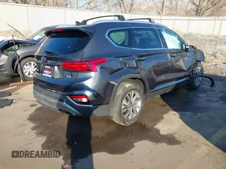 2020 Hyundai Santa Fe Limited with VIN 5NMS5CAD9LH273715, listed as a IAAI auction lot 41259190 with 14,669 mi miles and . Bid and sale history available at DreamBid. Image 4.