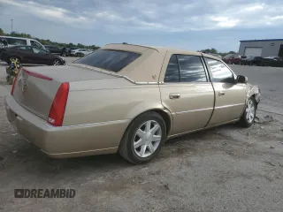 2006 Cadillac DTS 1SC z VIN 1G6KD57Y06U187282, wystawiony jako Copart lot #72627494 z przebiegiem 142 191 mil mil oraz Szkoda całkowita • Salvage title. Historia ofert i sprzedaży dostępna na DreamBid. Obrazek 3.