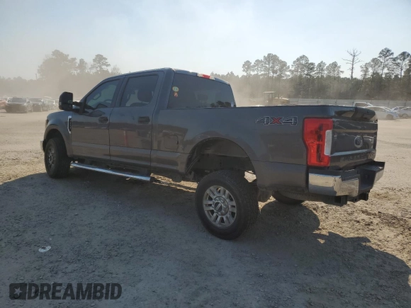2017 Ford Super Duty F-250 SRW Lariat with VIN 1FT7W2B63HEC64659, listed as a Copart auction lot 46911295 with 147,237 mi miles and Salvage Title. Bid and sale history available at carsss.com. Image 2.