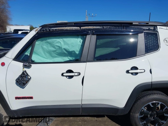 2023 Jeep Renegade Trailhawk z VIN ZACNJDC13PPP40710, wystawiony jako IAAI lot #41744475 z przebiegiem 17 057 mil mil oraz . Historia ofert i sprzedaży dostępna na DreamBid. Obrazek 15.