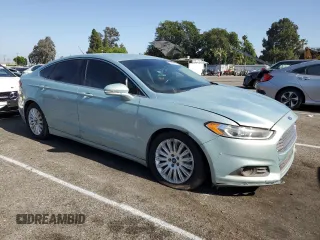 2014 Ford Fusion SE Hybrid with VIN 3FA6P0LU2ER159782, listed as a Copart auction lot 54444274 with 255,212 mi miles and Salvage Title. Bid and sale history available at DreamBid. Image 4.
