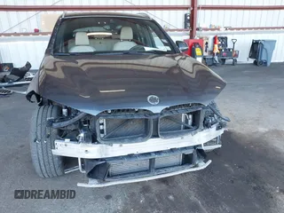 2021 BMW X1 xDrive28i with VIN WBXJG9C02M5T41170, listed as a IAAI auction lot 41886408 with 56,316 mi miles. Bid and sale history available at carsss.com. Image 6.