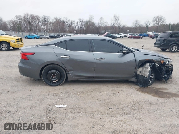 2018 Nissan Maxima S with VIN 1N4AA6AP0JC384660, listed as a IAAI auction lot 41617587 with 121,463 mi miles and . Bid and sale history available at DreamBid. Image 13.
