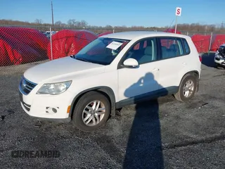 2011 Volkswagen Tiguan SEL with VIN WVGBV7AX7BW515233, listed as a IAAI auction lot 41234933 with 170,674 mi miles and . Bid and sale history available at DreamBid. Image 2.