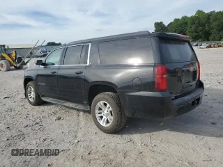2019 Chevrolet Suburban LT with VIN 1GNSKHKC2KR121661, listed as a Copart auction lot 67335274 with 94,756 mi miles and Salvage Title. Bid and sale history available at DreamBid. Image 2.