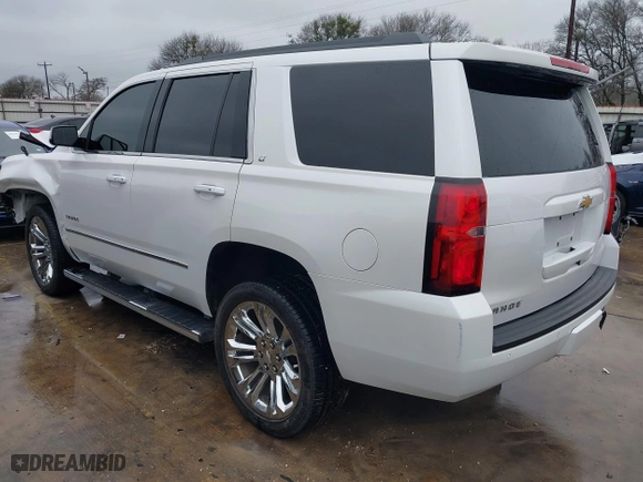 2018 Chevrolet Tahoe LT with VIN 1GNSCBKC5JR323595, listed as a IAAI auction lot 41550552 with 115,697 mi miles. Bid and sale history available at carsss.com. Image 3.