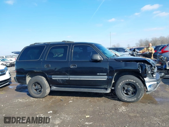 2002 Chevrolet Tahoe LT z VIN 1GNEC13Z02R203361, wystawiony jako IAAI lot #41580885 z przebiegiem 349 050 mil mil oraz . Historia ofert i sprzedaży dostępna na DreamBid. Obrazek 13.