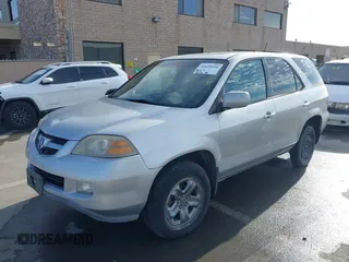 2004 Acura MDX with VIN 2HNYD18294H545516, listed as a IAAI auction lot 41620110 with 220,246 mi miles. Bid and sale history available at carsss.com. Image 6.