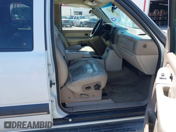 2002 Chevrolet Suburban LT with VIN 1GNEC16Z82J196802, listed as a IAAI auction lot 42284723 with 310,843 mi miles and . Bid and sale history available at DreamBid. Image 5.