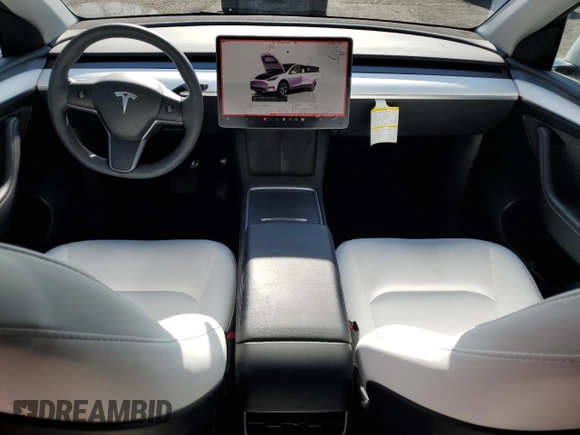 2023 Tesla Model Y Long Range with VIN 7SAYGDEE5PF831826, listed as a Copart auction lot 43752525 with 22,337 mi miles and Salvage Title. Bid and sale history available at DreamBid. Image 8.
