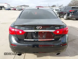 2015 Infiniti Q50 z VIN JN1BV7AP3FM335871, wystawiony jako IAAI lot #41472424 z przebiegiem 127 383 mil mil oraz . Historia ofert i sprzedaży dostępna na DreamBid. Obrazek 16.