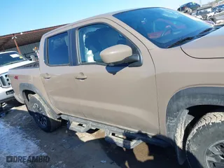 2024 Nissan Frontier PRO-4X with VIN 1N6ED1EK0RN645979, listed as a IAAI auction lot 41613465 with 19,241 mi miles. Bid and sale history available at carsss.com. Image 13.