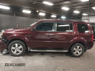 2009 Honda Pilot EX-L with VIN 5FNYF48569B021586, listed as a IAAI auction lot 41609721 with 291,598 mi miles. Bid and sale history available at carsss.com. Image 14.