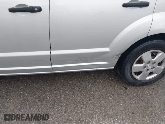 2007 Dodge Caliber with VIN 1B3HB28B87D545091, listed as a IAAI auction lot 41950729 with 163,951 mi miles and . Bid and sale history available at DreamBid. Image 6.