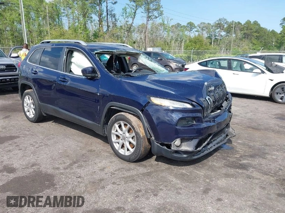 2015 Jeep Cherokee Latitude with VIN 1C4PJLCB5FW694359, listed as a IAAI auction lot 41934213 with 117,723 mi miles and . Bid and sale history available at DreamBid. Image 1.