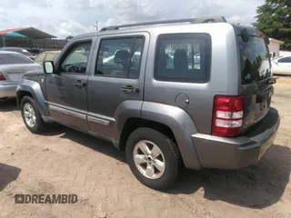 2012 Jeep Liberty Sport with VIN 1C4PJMAKXCW107531, listed as a IAAI auction lot 42155945 with 166,188 mi miles and . Bid and sale history available at carsss.com. Image 3.