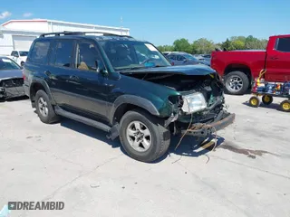 1998 Toyota Land Cruiser with VIN JT3HT05J2W0022171, listed as a IAAI auction lot 41886798 with 313,665 mi miles. Bid and sale history available at carsss.com. Image 1.