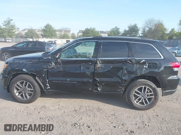 2021 Jeep Grand Cherokee Limited with VIN 1C4RJFBG2MC731163, listed as a IAAI auction lot 42096614 with 18,492 mi miles and . Bid and sale history available at DreamBid. Image 14.