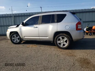 2010 Jeep Compass Sport with VIN 1J4NF4FB4AD513051, listed as a Copart auction lot 79667494 with 0 mi miles and Salvage Title. Bid and sale history available at carsss.com. Image 2.