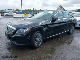 2016 Mercedes-Benz C-Class C 300 Luxury with VIN 55SWF4KB0GU150456, listed as a IAAI auction lot 41920406 with 124,371 mi miles. Bid and sale history available at carsss.com. Image 2.