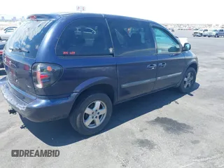 2005 Dodge Caravan SXT with VIN 1D8GP45R65B280660, listed as a IAAI auction lot 42169027 with 246,407 mi miles and . Bid and sale history available at carsss.com. Image 4.