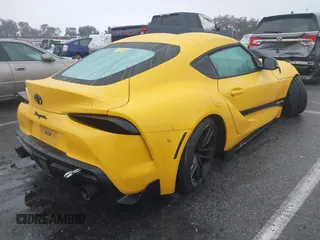 2021 Toyota GR Supra 3.0 with VIN WZ1DB0C00MW040302, listed as a IAAI auction lot 41512249 with 51,180 mi miles. Bid and sale history available at carsss.com. Image 4.